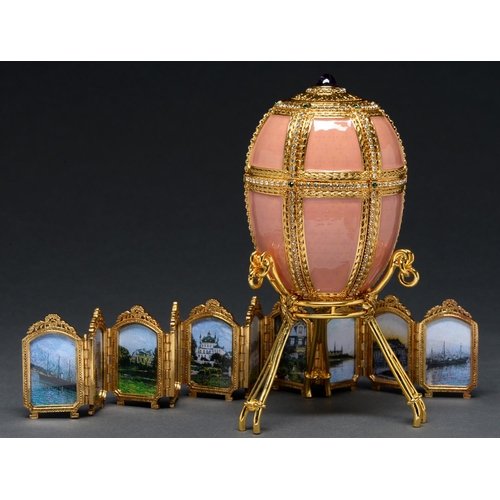 594 - A Faberge Imperial Danish Palace egg and stand, recent manufacture, 10cm h, boxed