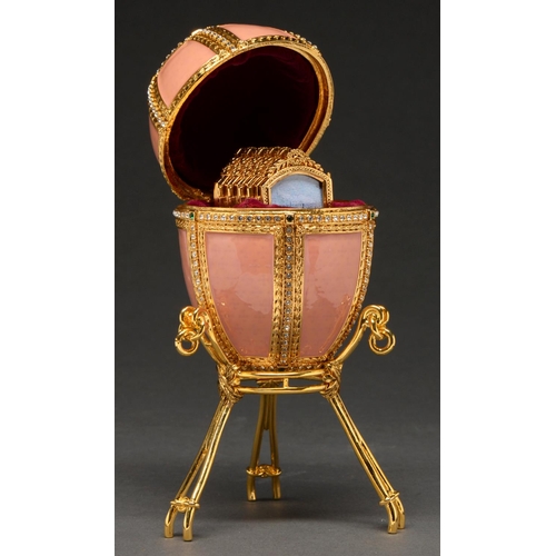 594 - A Faberge Imperial Danish Palace egg and stand, recent manufacture, 10cm h, boxed