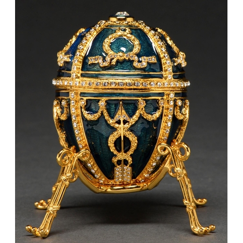 595 - A Faberge Rosebud egg and stand, recent manufacture, egg 65mm h, boxed