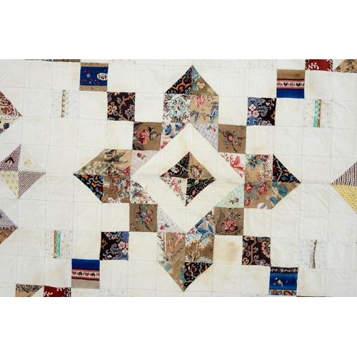 778 - Folk Art. A mid-Victorian patchwork quilt, Mary Rawlinson, 1874, outlined by a large kite enclo... 