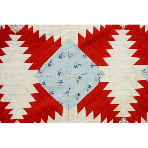 779 - Folk Art. A patchwork pineapple design quilt, late 19th c, worked with various polychrome texti... 