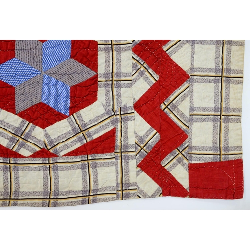 781 - Folk Art. A patchwork quilt, late 19th/early 20th c, worked with six-pointed stars within heptagons ... 