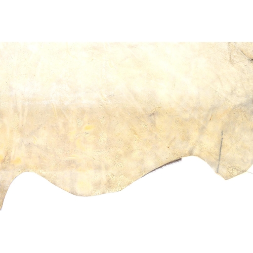 933 - A vintage cow hide rug, 210 x 170cm