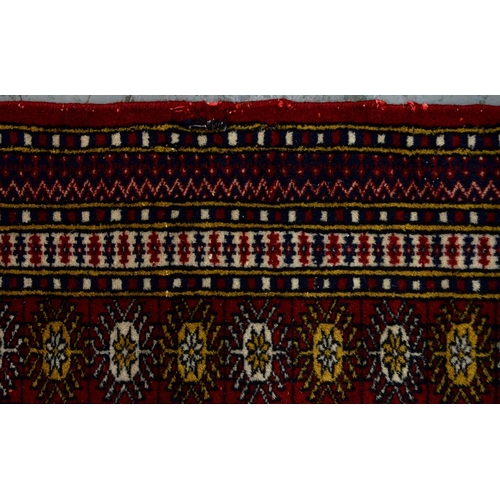 941 - Two Pakistan rugs, 166 x 118cm and 150 x 93cm