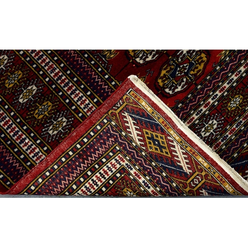 941 - Two Pakistan rugs, 166 x 118cm and 150 x 93cm