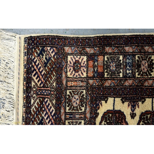 941 - Two Pakistan rugs, 166 x 118cm and 150 x 93cm