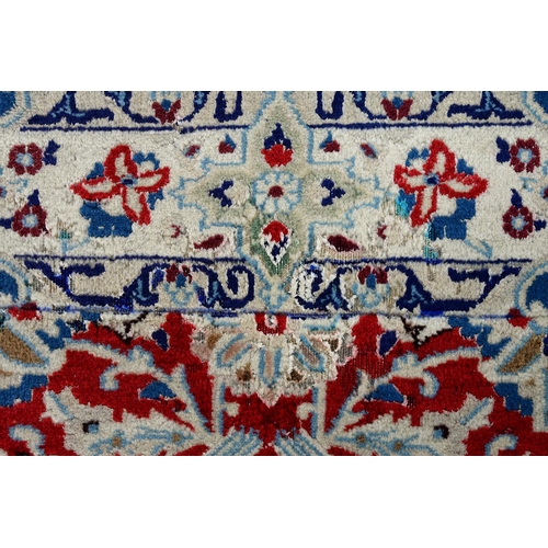 949 - An Isfahan rug with silk highlights, 193 x 124cm