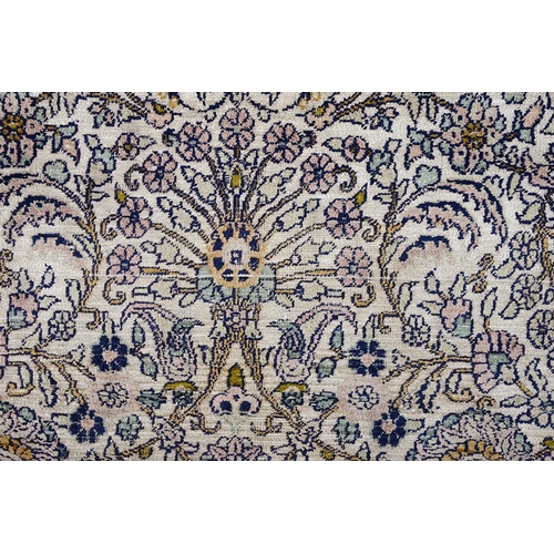 950 - A Kashmir silk floral rug, 150 x 95cm