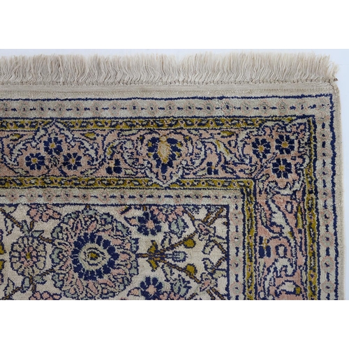 950 - A Kashmir silk floral rug, 150 x 95cm