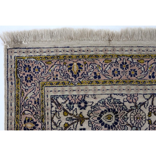 950 - A Kashmir silk floral rug, 150 x 95cm