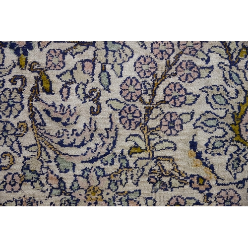 950 - A Kashmir silk floral rug, 150 x 95cm