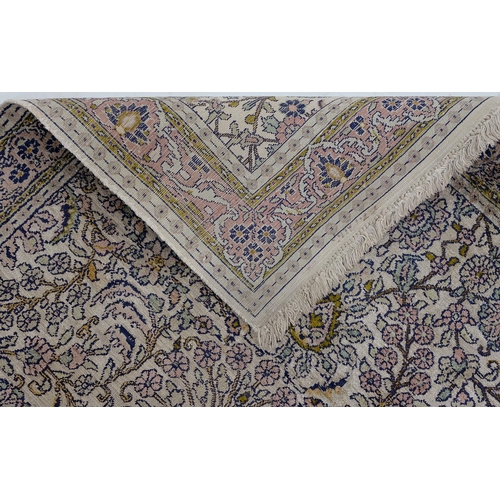 950 - A Kashmir silk floral rug, 150 x 95cm