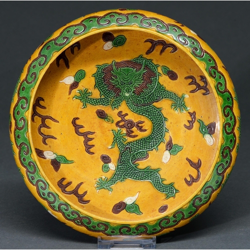 445 - A Chinese green, aubergine and yellow glazed dragon bowl, 20th c,  with an export porcelain blue and... 