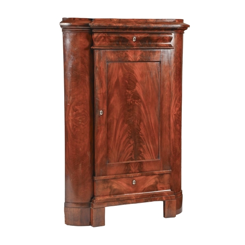 990 - A French mahogany standing corner cupboard, 19th c, with panelled door and mother of pearl escutcheo... 