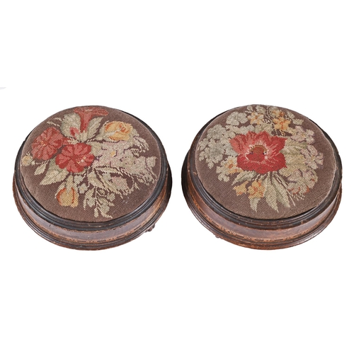 1006 - A pair of Victorian inlaid mahogany foot stools, with woolwork top, 29cm diam