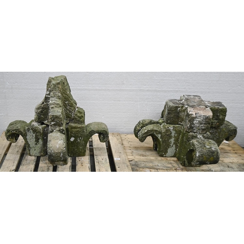 1015 - Two stone pier capitals or finials, 19th c, each of four scroll elements, one approximately 51cm h; ... 