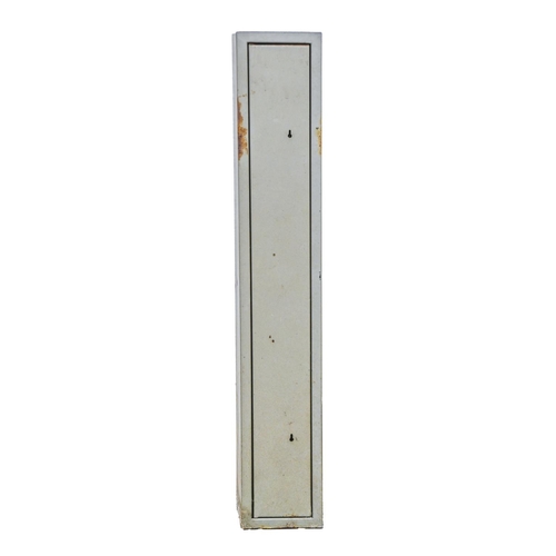 1021 - A steel gun safe and key, 131cm h