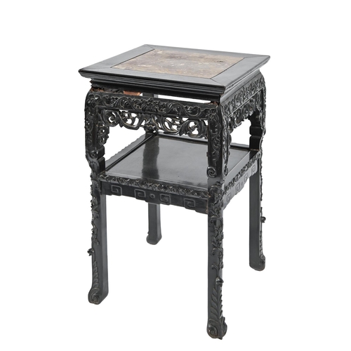 1023 - A Chinese carved hardwood jardiniere stand, c1900, with marble inset top, 83cm h; 50 x 51cm... 