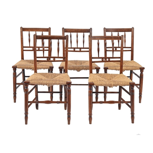 1030 - Five near matching English ash and fruitwood rush seated chairs, early 19th c, with spindle back and... 