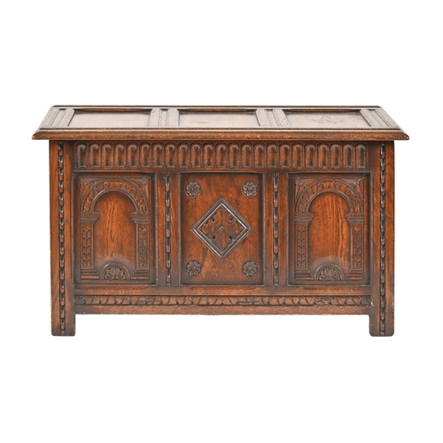 1048 - An oak chest, 106cm l