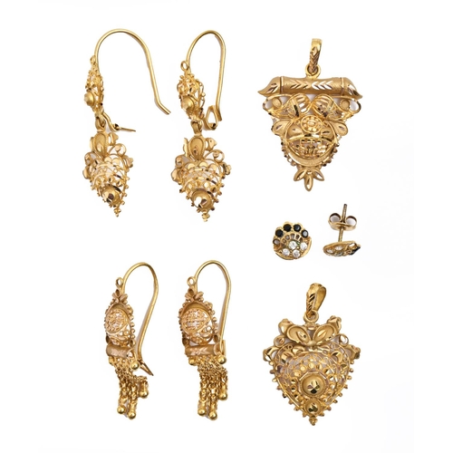 149 - Three pairs of Indian gold earrings,  two with wire loop and a pair of similar gem set gold ear stud... 