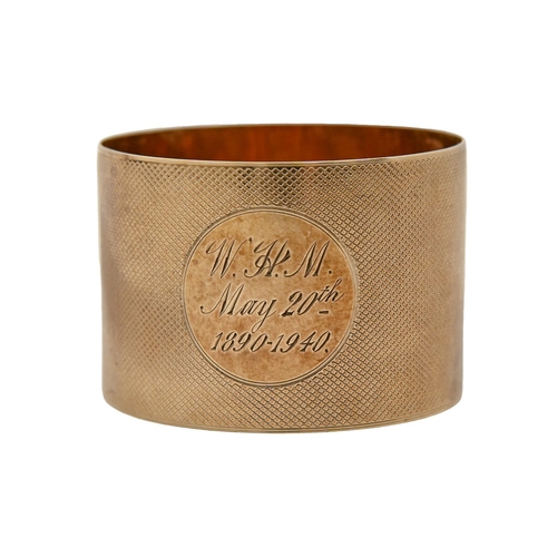 241 - Gold. A George VI 9ct gold napkin ring, engine turned, by Payton, Pepper & Sons Ltd, Birmingham ... 