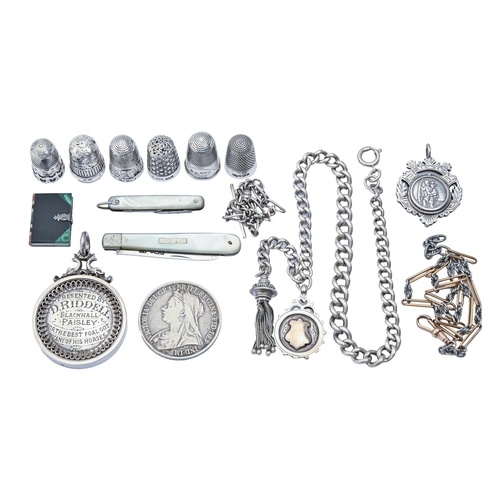 249 - A gold and bi-metal albert, two silver alberts and other silver articles, including watch fob shield... 