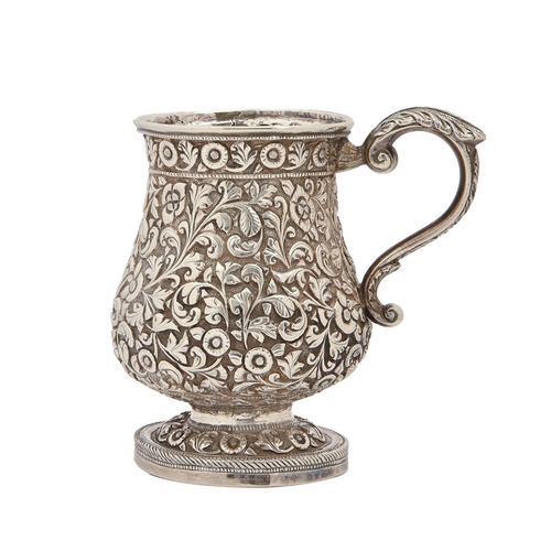 253 - An Indian silver repousse baluster mug, mid 19th c,  Cutch 10.5cm h, 5ozs 17dwts