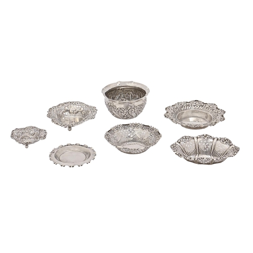 312 - Six late Victorian and Edwardian die stamped silver bonbon dishes and a cache pot, various sizes, ma... 