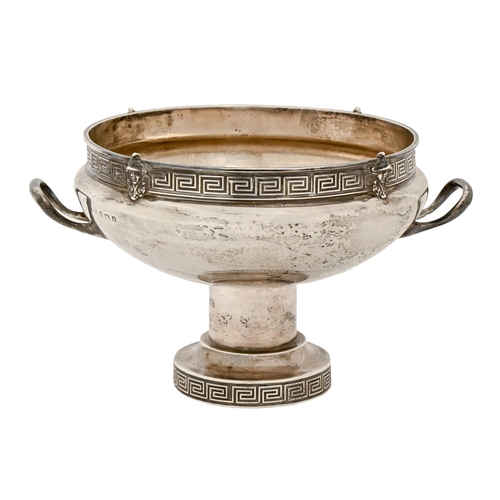 324 - An Edwardian silver pedestal bowl, with Greek key borders, applied masks and handles, 13cm h, by Eva... 