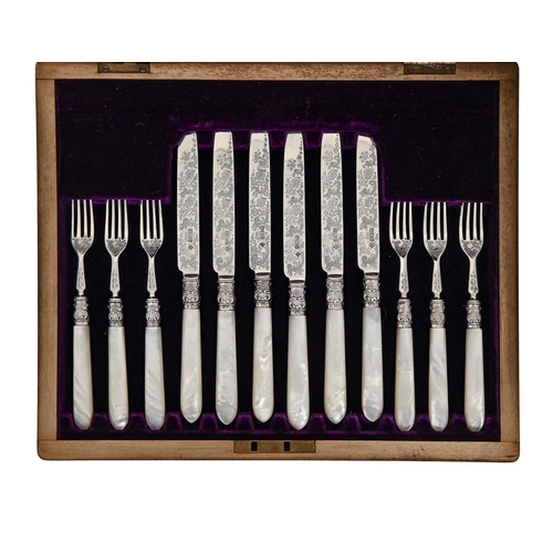 346 - A set of six Victorian mother of pearl hafted silver dessert knives and forks, by Martin, Hall &... 