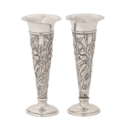 355 - A pair of Edwardian silver vases, die stamped with irises, 16.5cm h, by William Comyns & Sons, L... 