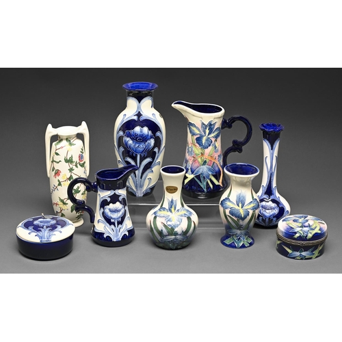 395 - Five Old Tupton Ware vases, two jugs and two boxes and covers, decorated in Moorcroft style, various... 