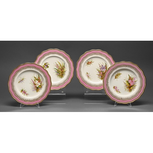 416 - A set of four English porcelain shaped circular dessert plates, dated 1868, painted with sprigs of c... 