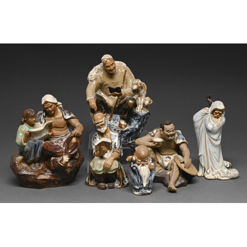 441 - Six Japanese glazed stoneware figures of artisans and others, 20th c, 19cm and circa... 