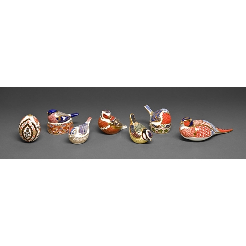 467 - Seven Royal Crown Derby paperweights, including an egg, printed mark and gilt stopper or stopper alo... 