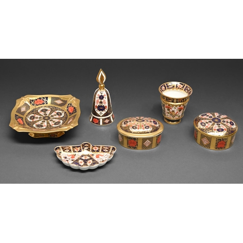 470 - Two Royal Crown Derby Imari pattern round and oval boxes and covers, a vase, hand bell and two other... 