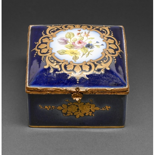 483 - A Continental porcelain box, painted with flowers in raised gilt surround, on a cobalt ground, giltm... 