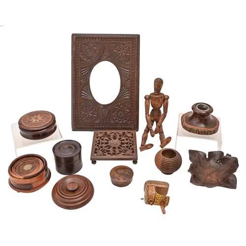 584 - Miscellaneous treen and other items, including turned wood boxes and covers, inkwell, carved oval pi... 