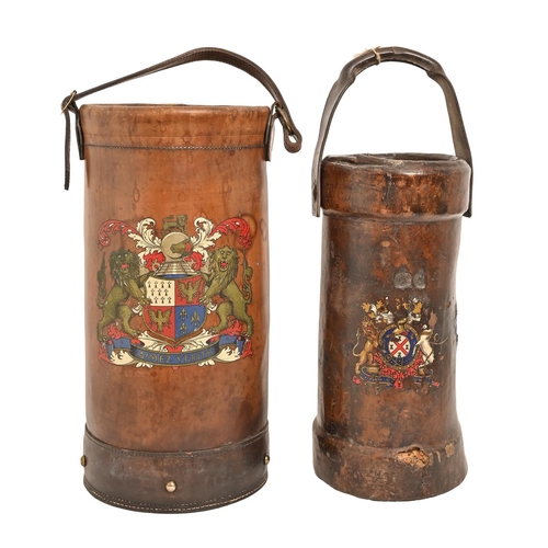 613 - A late 19th c leather cordite bucket, painted with a coat of arms, 44cm h and a later leather stick ... 