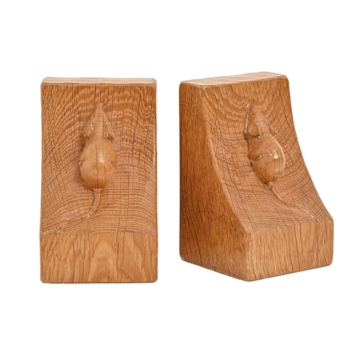 618 - A pair of Mouseman oak book ends, 15cm h, carved mouse 'signature'