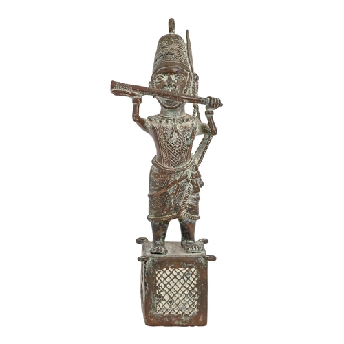 623 - Tribal art. West Africa - a Benin style bronze figure of a warrior, mid 20th c, 53cm h... 