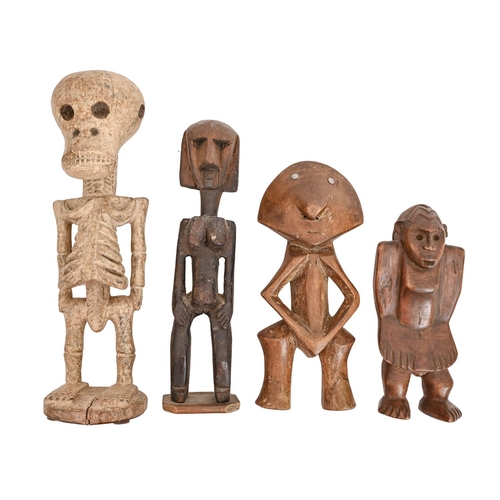 637 - Tribal art. Central Africa - a Luba carved wood skeleton figure, 40cm h, a Kumu carved wood figure a... 