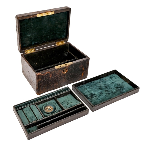 669 - A Victorian blind tooled leather covered jewel box, brass handle, lock and keys, 23cm l... 