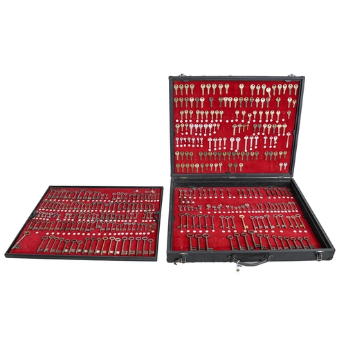 687 - A traveller's case of key blanks with detachable tray, mid 20th c, approximately 300 keys mounted on... 