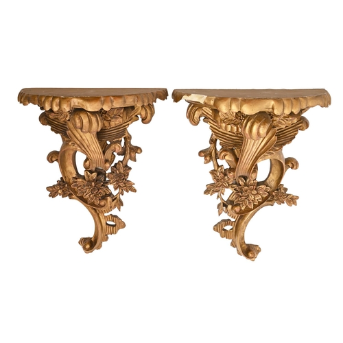 700 - A set of six rococo style gilt resin wall brackets, 20th c, 43cm h