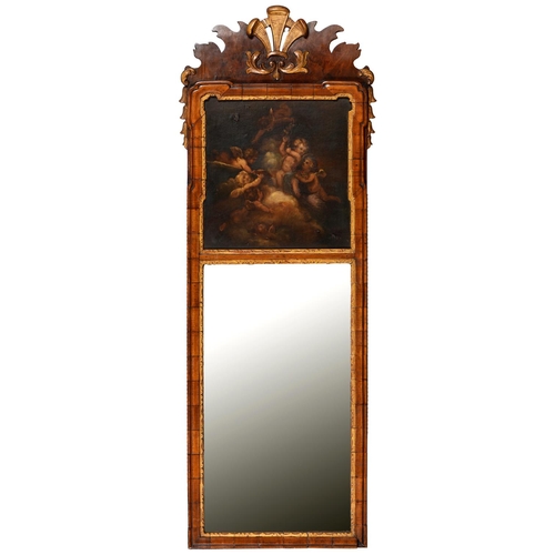 919 - A parcel gilt walnut mirror, early 20th c, painted with putti in clouds, 120 x 42cm