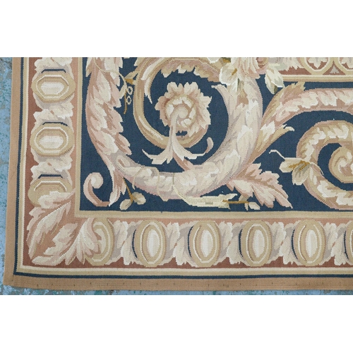 922 - A needlepoint rug, in the 18th c taste, 20th c, 262 x 192cm