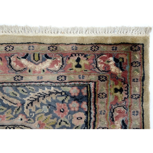 926 - An Indian rug, with silk highlights, 118 x 78cm