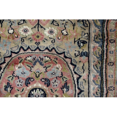 926 - An Indian rug, with silk highlights, 118 x 78cm